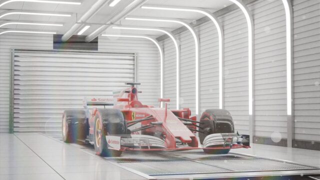 Sleek Red Formula One Car in Modern Garage